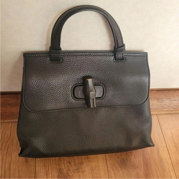 Gucci Handbags - Gucci Dark Leather Satchel